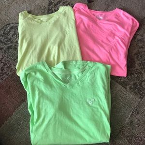 Three men’s American eagle Tees